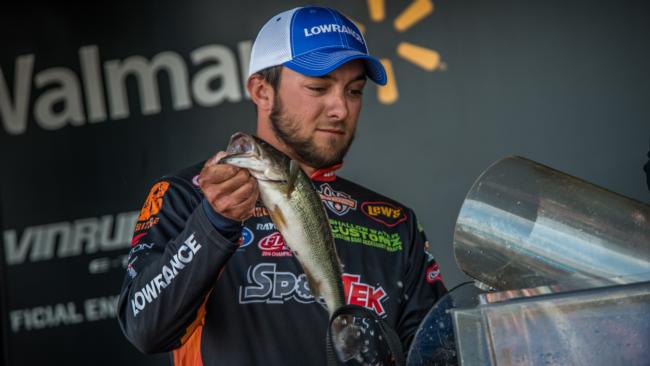 Day-three leader Zack Birge loads his fish into the scales. He stumbled to sixth on the final day. 